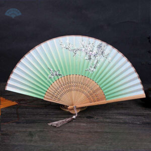 Éventail chinois vert en bois brut Tao Lao